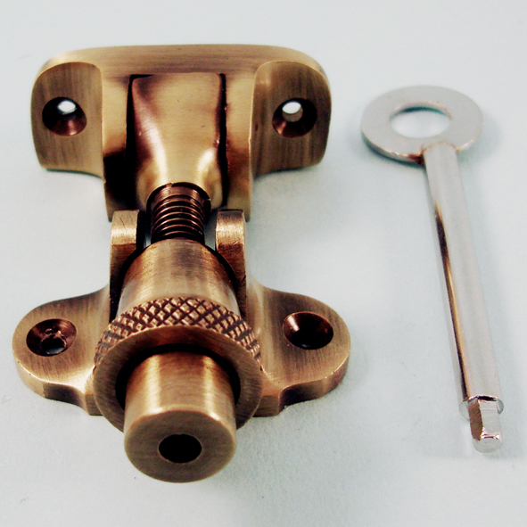 THD107L/AB • Locking • Antique Brass • Locking London Style Brighton Pattern Sash Fastener